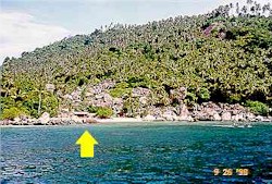 A look at the resort (see yellow arrow) from the boat