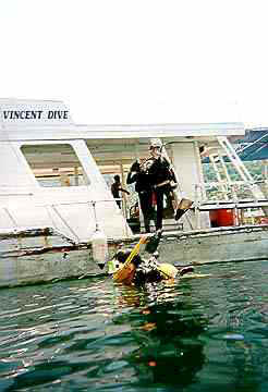 Doing the "giant stride" from the port side of the vessel