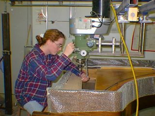 That's me! drilling a pin block for our grand piano, late 1997