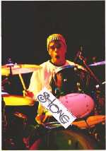 oscar playing drums, head on