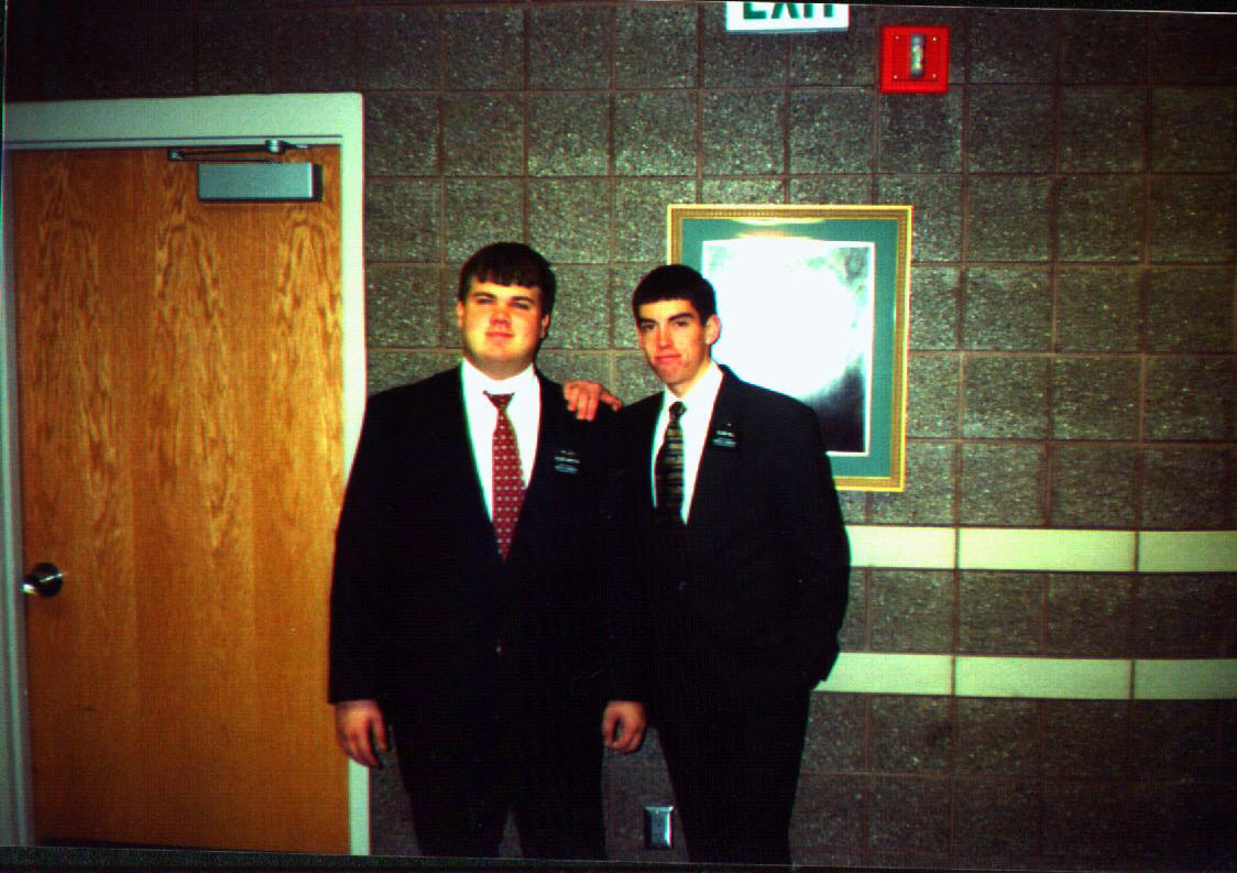Friends, my companion Elder Hill and I (I have no clue where I am looking) - Dec '98