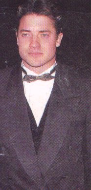 a 1995 photo of Bren clad in a tuxedo . . . I performed some creative editing on this one to put the spotlight on him and not so much his gorgeous blonde date