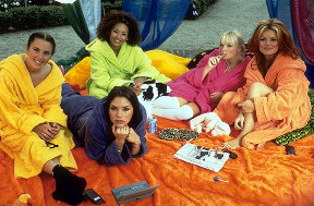 Spice Girls in thier florecent robes.
