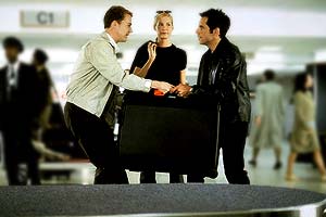 Jake and Brian fight over Anna's suitcase