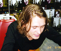 Mark Owen while signing.