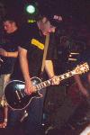 The other guitarist and the singer