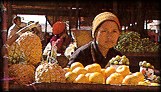 Woman selling vegetables in a local market