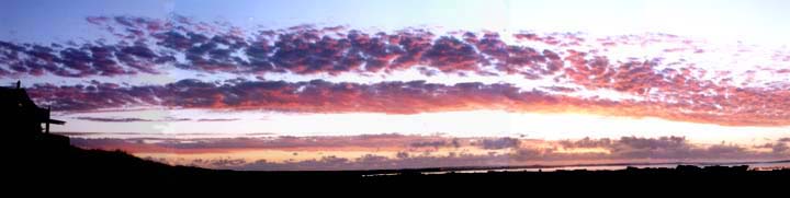 Photograph of Sunset over Kommetjie Beach. Cape Town.
