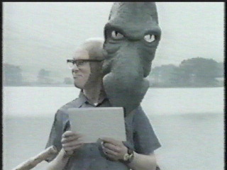 arthur in loch ness unaware of monster
leaning over