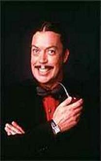 Tim Curry As Gomez Addams