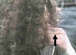 ravens ankh tattoo on his hand