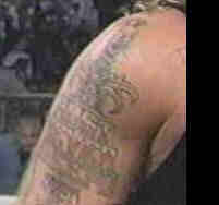 ravens ankh tattoo on his arm