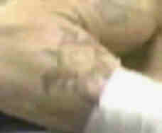 ravens ankh tattoo on his arm