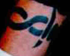 ravens ankh tattoo on his forearm