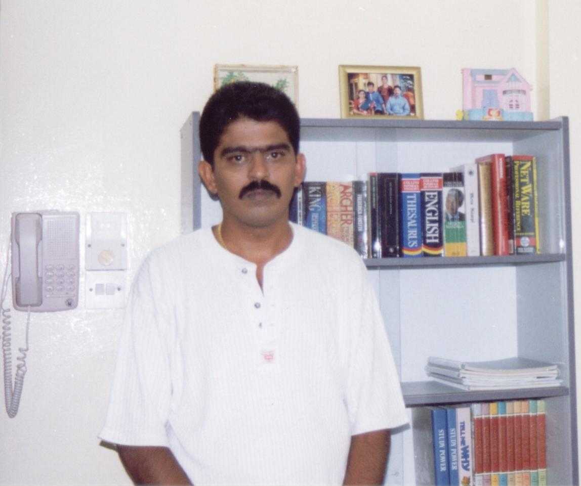 Myself in front of my book shelf