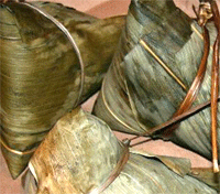 Image of glutinous rice in bamboo leaves or chung