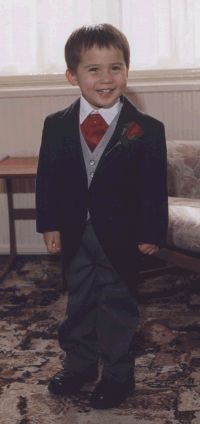 My eldest son acting as Ring Bearer at a wedding