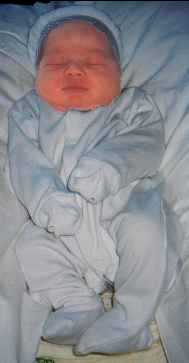 Ryan, born 28/12/1999 8.49am weighing 9 lbs!