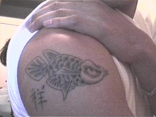 Dragonfish tattoo + "Good Fortune" In Japanese
