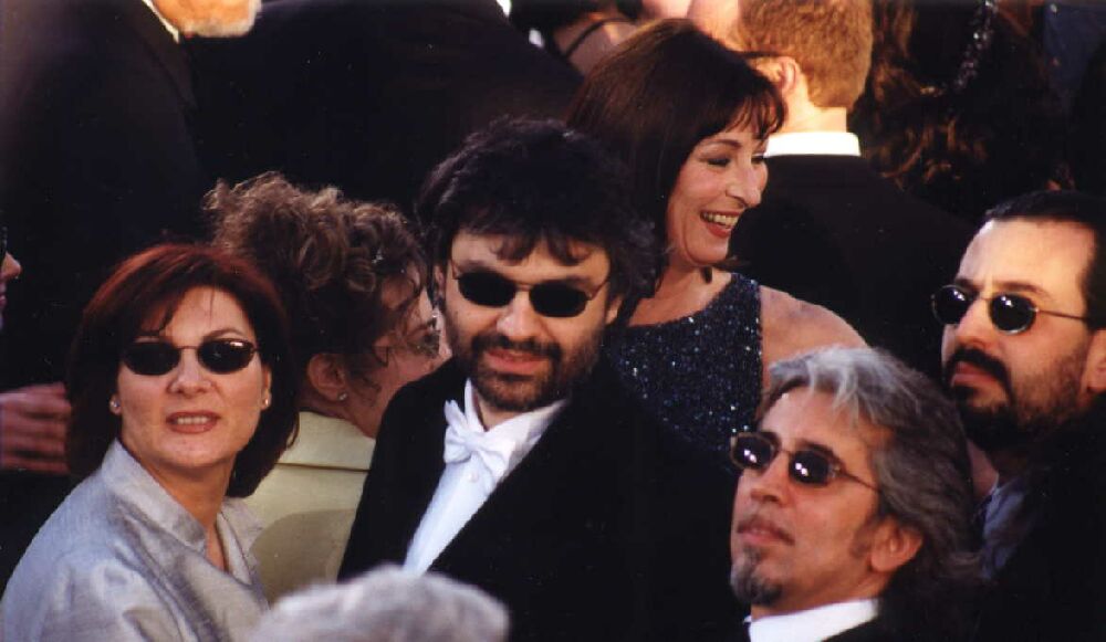 Andrea Bocelli at the Academy with Michele Torpedini (manager) Alberto (brother) and Angelica Houston