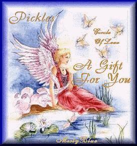 angel in red dress by lake