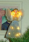Angel on our tree now