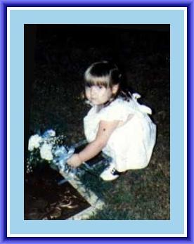 Gina Putting Flowers on Kyles Grave