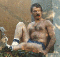 Alex sitting on a ledge