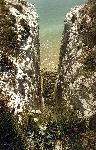 Down a fissure to the beach