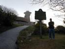 Chris standing at the landmark sign