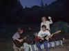 More campfire music with an electric bass guitar plugged into a 12 volt amp which was plugged into the boat 100 feet away!