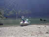 Dave on the boat at our sandy beach camp zone