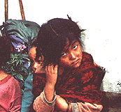 girl carrying baby