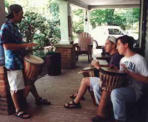 3 drummers on porch