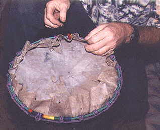 Gordon adjusting the skin after
locking it on with the second ring.
SEE where I get skins and how I prepare them.