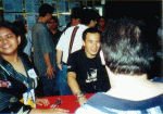 Shaking hands with a fan