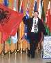  F. Velaj ,Albanian painter during
 his  exhibition in the European Parlament