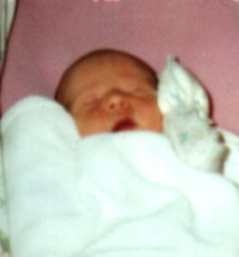 Amber sleeping when she was first born