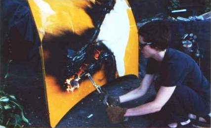 Annie wielding the cutting torch