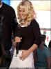 Jessica y Nick en TRL de MTV el 19 de agosto