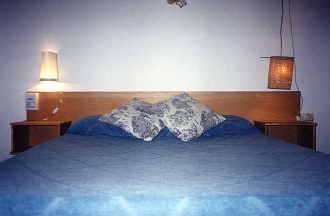 Doprmitorio con cama matrimonial