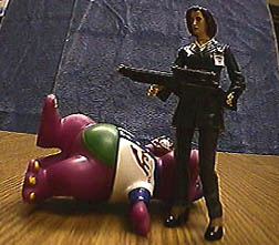 Scully kicks some alien butt