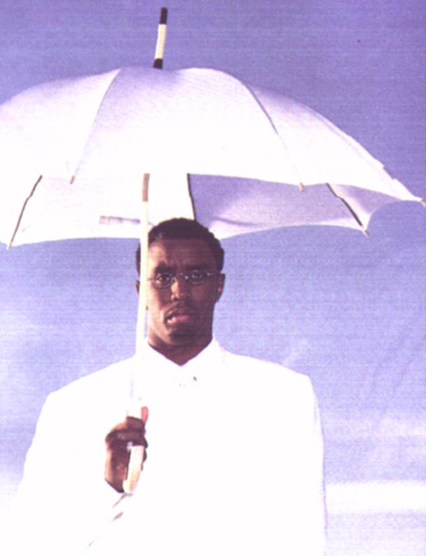 Puffy holdin' an umbrella