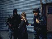 Scully Taken into Custody
