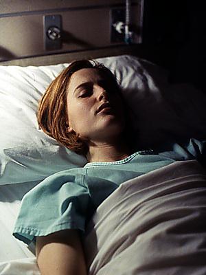 Scully in bed