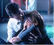 Doggett holding Scully