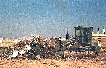 Plant Troop, Engineer Squadron 3 Regiment's bulldozer in action at Pembroke, St. Andrews.
