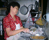 Woman making sung kueh
