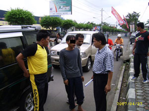 Suspect is brought to the crime scene