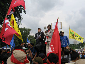 Transgender figure heads giving their speeches.